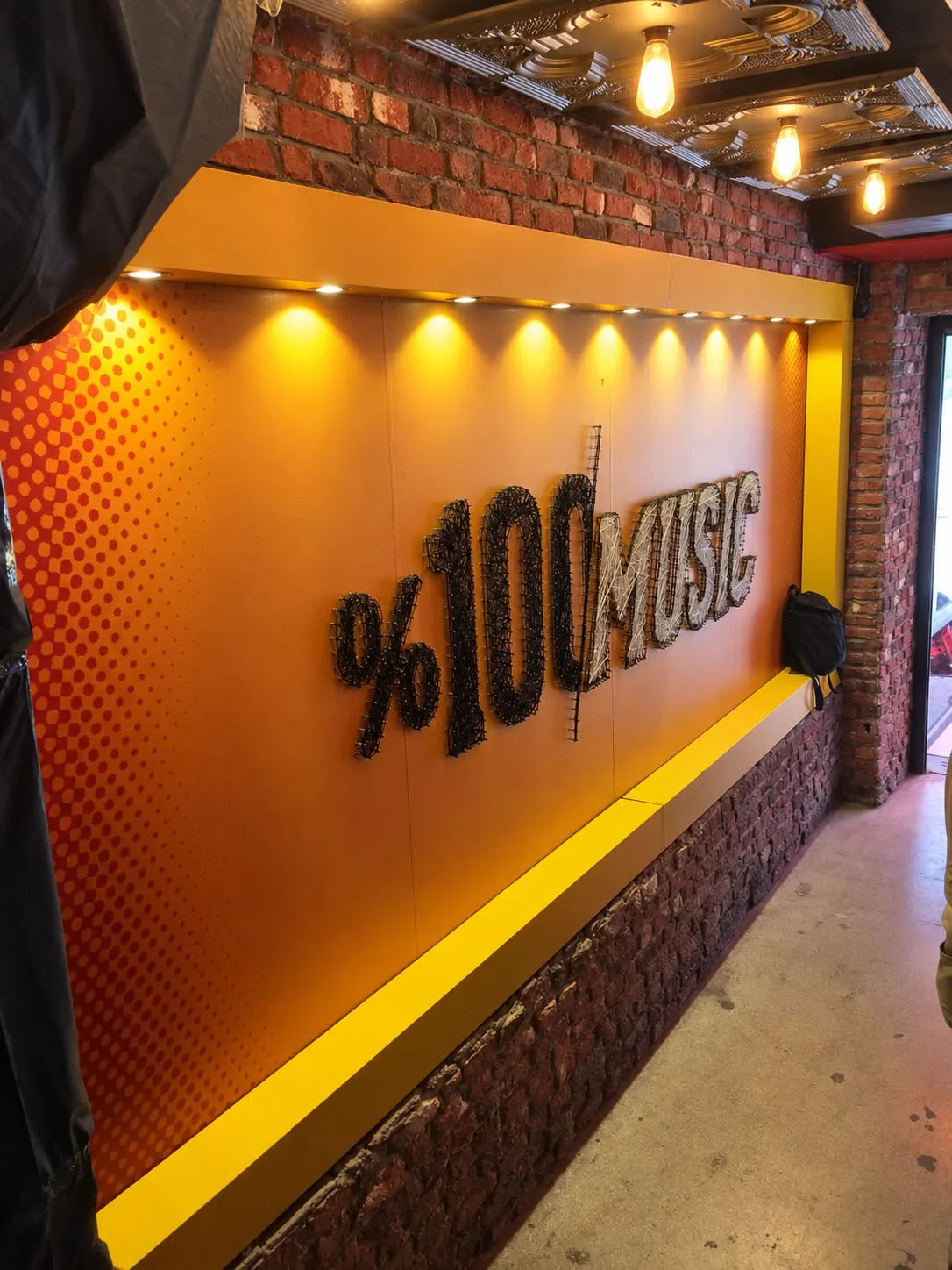 %100 Music — feature wall — Image 2 of 2